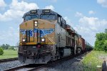 A unit tank car train rolls west on the Houston Sub